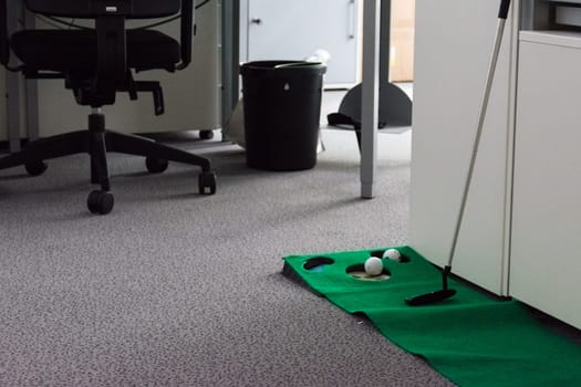 Putting Green in Modern White Office Corporate Fun Entertainment Sport Putter Balls Hole