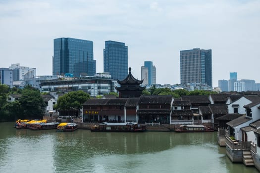 Traditional Architecture and Modern Architecture in Shan Tang Jie in Suzhou, China on June 2nd, 2018