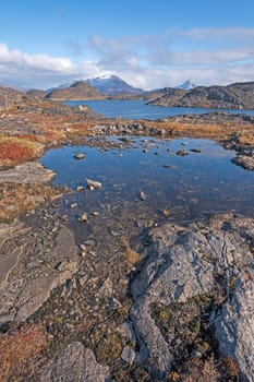 Tundra ponds and Mountains in the arctic near Itilleq, Greenland