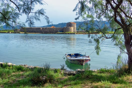 Butrint Lake with castle in the background in Albania