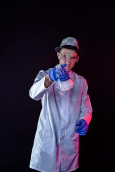 Smiling man scientist with dry ice