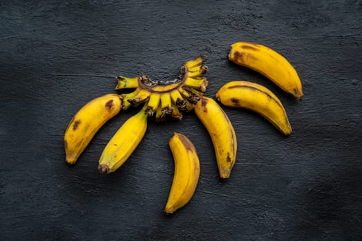 Overripe  bananas on dark background.