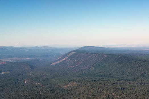Densely forested landscape in Central Oregon as seen from Black Butte
