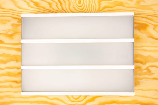 Blank Letter Light Box on wooden Background