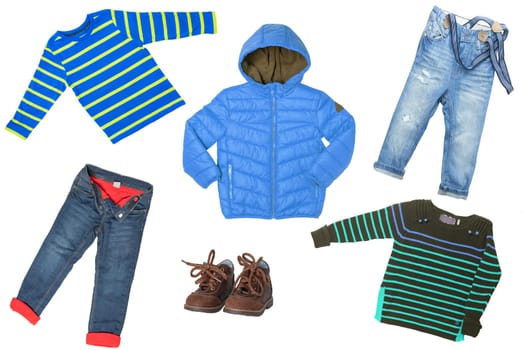 Child clothes isolated. Collage set of children clothes isolated on a white background. Concept spring autumn and winter fashion for children.