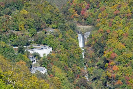 Akechidaira Plateau is located near the top of the ascending Irohazaka Winding Road. At the plateau, there is a parking lot with a free observation area that offers nice views onto the Irohazaka and the valley below. During autumn, this becomes a popular autumn color spot as fall colors spread across the landscape.