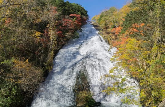 Yutaki waterfall in Nikko, Tochigi Prefecture has huge water flow down from the top especially during rainy days. There are viewing platforms halfway down the staircase by the side. It looks much prettier when there are colored leaves on both sides of the waterfall.