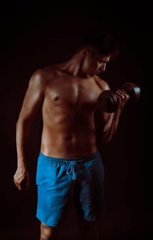 Musculed man model posing in studio