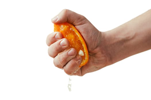 man dramatic squeezes orange. Concept squeezed a man is tired from work.