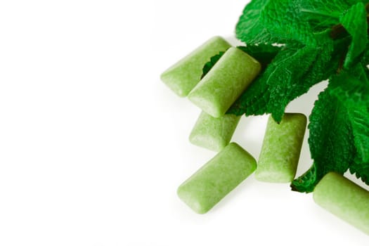 green chewing gum on white - food and drink