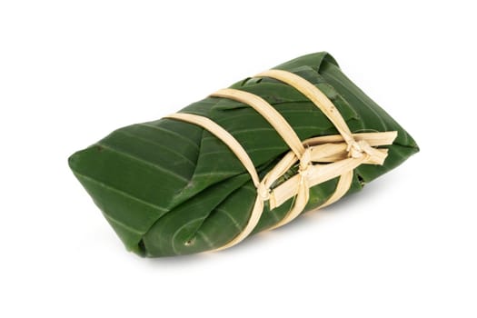 Sticky Rice In Banana Leaf, traditional thai food on white background