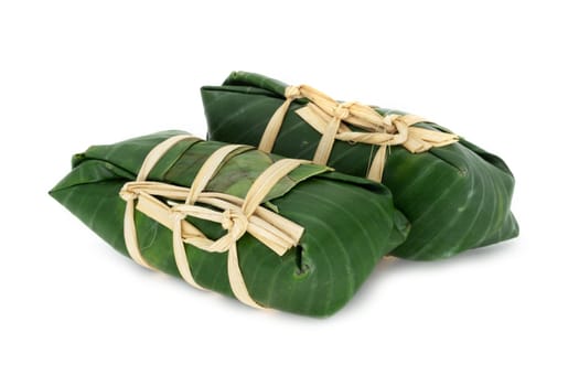 Sticky Rice In Banana Leaf, traditional thai food on white background