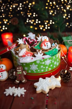 Festive cookie jar with beautifully decorated Christmas cookies