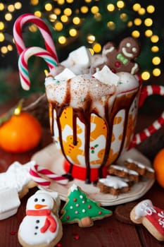 Festive Christmas mug of hot chocolate with marshmallows and whipped cream
