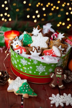 Festive cookie jar with beautifully decorated Christmas cookies