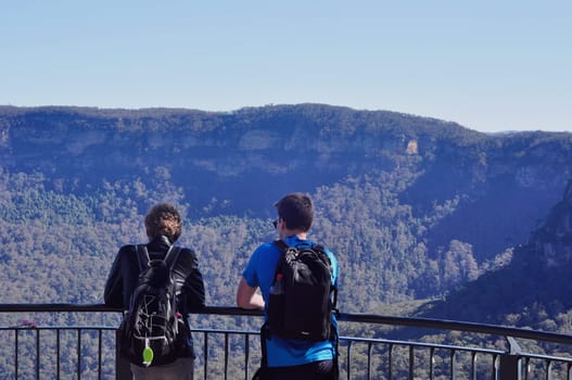 young mens enjoying scenic view of blue mountains near Sydney, New South Wales, Australia
