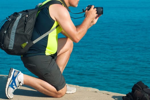 Man photographing the sea on the bondi beach of Sydney,Autralia.