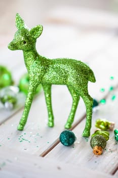Cheerful decorations and ornaments in various green tones for Christmas