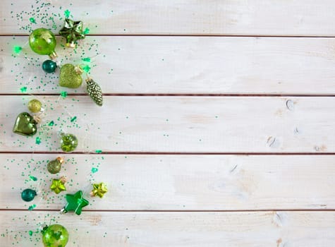 Cheerful decorations and ornaments in various green tones for Christmas
