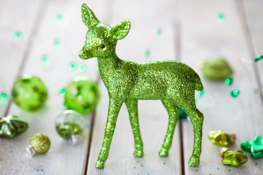 Cheerful decorations and ornaments in various green tones for Christmas