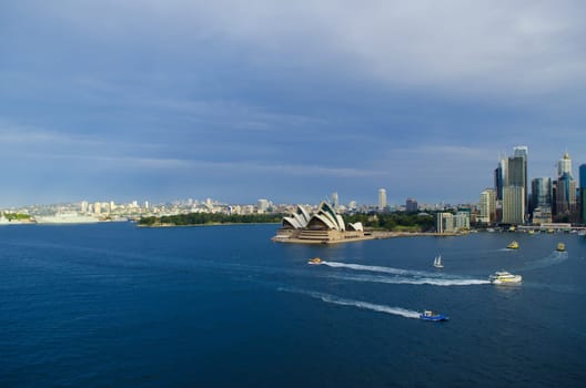 SYDNEY, AUSTRALIA - AUGUST 15, 2017.Vew on the Skyline of Sydney and the Sydney Opera House. Seen from the Sydney Harbour Bridge.