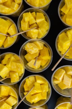 Abstract Bright Yellow Pineapple Fruit in Cups