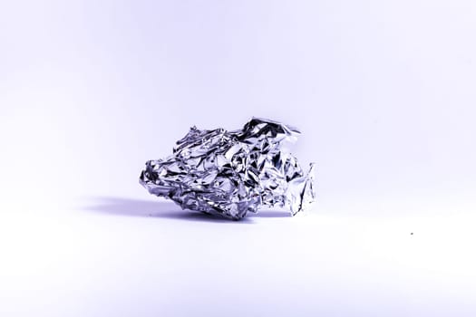 Aluminum Foil Crumpled Wrinkled Ball Shiny Metal White Background