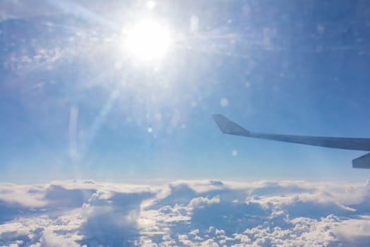 Airplane Wing Solar Flare Above Clouds Travel Blue Sky Day Airborne