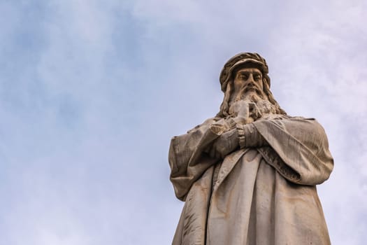 Leonardo Da Vinci Statue Milan Italy Blue Sky Closeup Portrait Body Clothes Texture