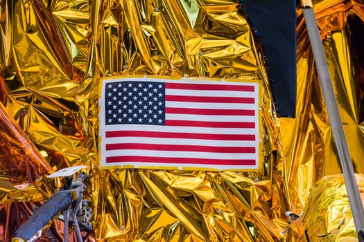 American Flag Closeup Backlit USA Patriotism Hanging Background Texture Rover Gold Crumpled Foil