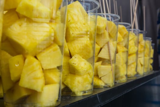 Abstract Bright Yellow Pineapple Fruit in Cups