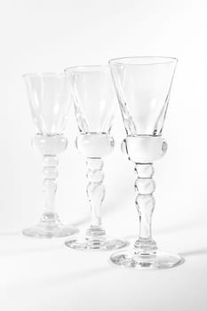 Single Shot Glass Wine Style Isolated White Background Triple Three Together Full Empty Contrast Elegant Fancy Round Stem