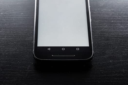 Blank White Screen Frame Cell Phone Android Black Wood Desk