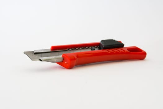 Bright Red Box Cutter Metal Blades New Clean Object White Background