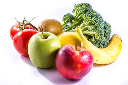Colorful Group of Fresh Foods Broccoli Banana Apples Kiwi Tomatoes Vegetables Fruits Healthy Diet Isolated White Background