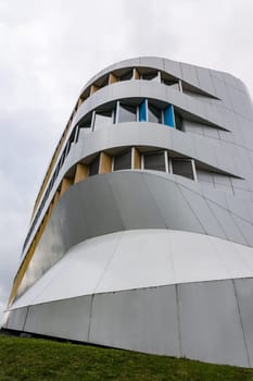 Contemporary Architecture Exterior Curvy Blue Gold Metal Steel Lines Building University Stuttgart Exterior Overcast Weather