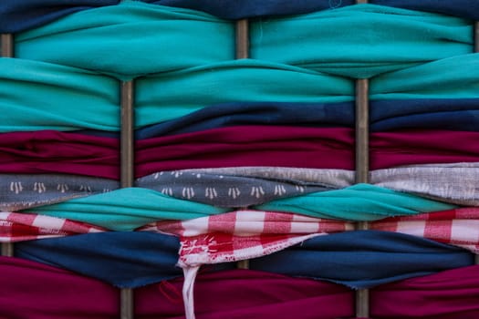 Fabric Pieces Wrapped Between Metal Fence Texture Macro