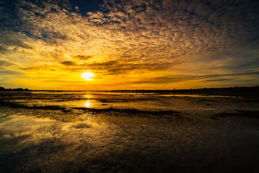 Sunset With Reflection Lake, idyllic landscape with dramatic sky