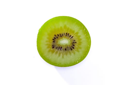 Fresh Kiwi Slice Half Cut Fruit Green Seeds Radial Texture Detail Isolated White Background Round Circle