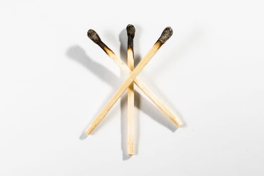 Match Stick Macro Detail Fire Symbol Safety White Isolated Background Charred Used Burned Burnt Black Wood Row Single Campfire