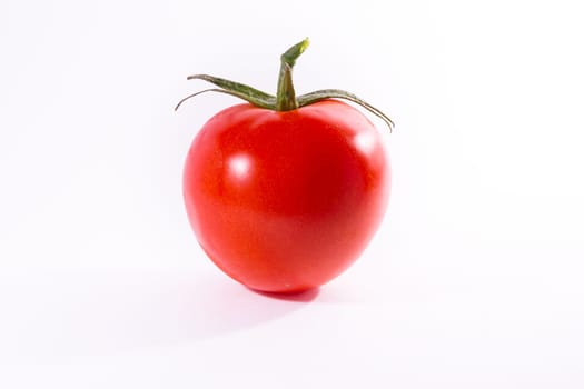Single Tomato Vegetable Stem Cooking Fresh Ingredient Isolated White Background
