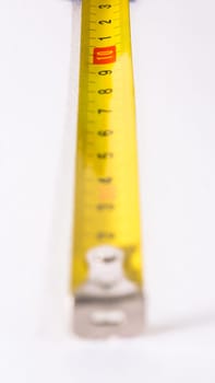 Tape Measure Rolled Out Yellow Bright Lines Closeup Construction