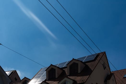 Solar Panels on German House Roof Blue Sky Technology