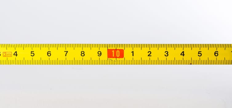 Tape Measure Rolled Out Yellow Bright Lines Closeup Construction