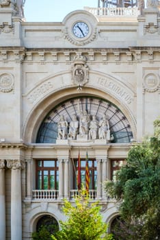 Valencia, Spain, May 2013: detail of the main facade of the central post office in Plaça de l'Ajuntament in Valencia, Spain