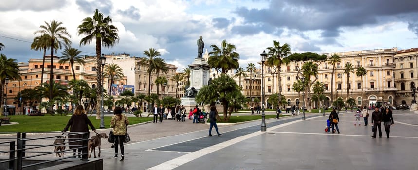 Rome, Italy, February 2017: people walking in Piazza Cavour on a winter day