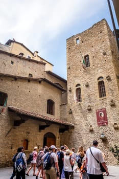 Florence, Italy, 29 June 2015: tourists queued up waiting to visit the birth house of the Italian poet Dante Alighieri in Florence, Italy