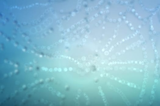 Abstract soft blue rain drops background texture with blurred bokeh lights. Beautiful blue texture.