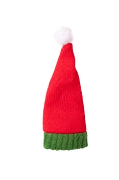 Closeup of a Santa Claus hat isolated on a white background. Christmas decorations background.