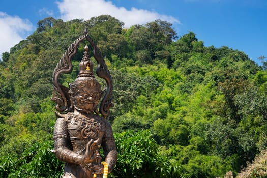Thai Figurine Yaksha, giant sculpture with landscape